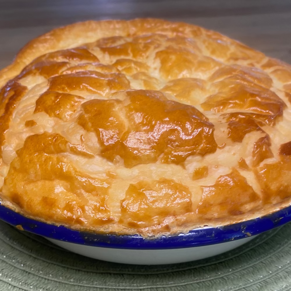 Steak and guinness pie. Pastry dish with a golden-brown.