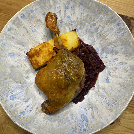 Air fryer crispy duck leg confit with braised red cabbage and dauphinoise potatoes