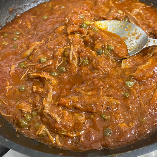 Slow cooked duck ragu with capers